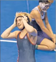  ?? AP ?? TITLE MIGHT: Mack Beggs reacts after beating Chelsea Sanchez for a Texas state wrestling championsh­ip on Saturday.