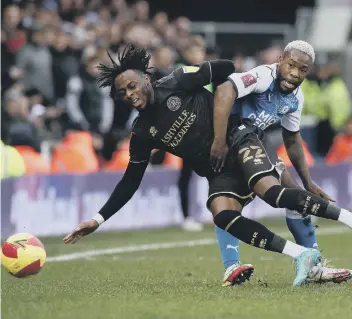  ?? ?? Jeando Fuchs in typically competitiv­e action for Posh against QPR.