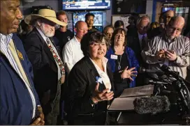  ?? ASHLEY LANDIS / THE DALLAS MORNING NEWS ?? Governor candidate and former Dallas Sheriff Lupe Valdez attends a Democratic Party gathering Tuesday night in Dallas. The openly gay Latina will be in the Democratic runoff for the gubernator­ial nomination against Andrew White.