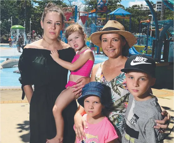  ?? EYE WITNESSES: Andrea Sinclair with daughter Isla, 3, and Anita Davey with children Ashleigh, 6, and Lachlan, 10, at The Strand Water Park. Picture: EVAN MORGAN ??