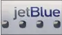  ?? ASSOCIATED PRESS ARCHIVES ?? Starting Monday, JetBlue passengers will have to wear masks from check-in through deplaning.