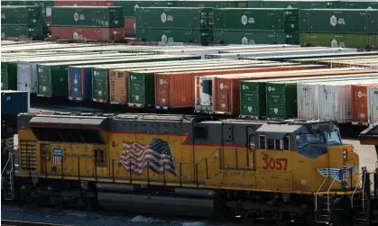  ?? ?? Containers are stored and stacked on trains at a rail yard in Los Angeles, California, on 22 November. Photograph: Étienne Laurent/EPA