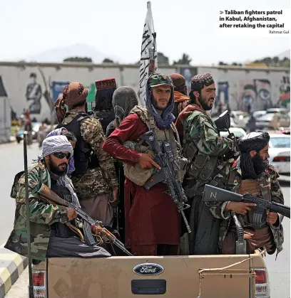  ?? Rahmat Gul ?? Taliban fighters patrol in Kabul, Afghanista­n, after retaking the capital