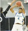  ?? JAMES C. SVEHLA/DAILY SOUTHTOWN ?? De La Salle’s Bryant Hedrick (4) shoots as Fenwick’s Kelvyn Darshan Thomas defends during a Class 3A De La Salle Sectional semifinal on Tuesday.