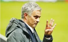  ??  ?? (FILES) This file photo taken on May 24, 2017 shows Manchester United’s Portuguese manager Jose Mourinho shows four fingers for his four European titles after the UEFA Europa League final football match Ajax Amsterdam v Manchester United on May 24,...
