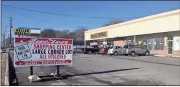  ?? Doug Walker / RN-T ?? This strip shopping center at 1431 N. Broad St. will be auctioned off March 22. It is owned by a corporatio­n with a lot of retail properties from Georgia to Texas.