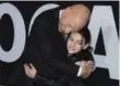  ??  ?? Actor Patrick Stewart embraces Logan co-star Dafne Keen.