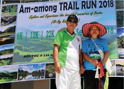  ?? Photo by Nicole Jane Lingbanan ?? OLD BUT GOLD. 65 – year – old Paula Acofo receives her award from Mayor Franklin Odsey as the oldest runner who participat­ed in the Am-among Trail Run on September 30, 2018. Acofo signed up for the 22 Kilometer distance and finished the race.