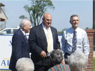  ??  ?? n Marvin F. Poer, Rex Burks and Dwight Byrd share in the dedication of the new building for the James Bowie alumni members.