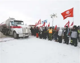  ?? TROY FLEECE ?? Fuel trucks have resumed entering Regina’s Co-op Refinery Complex as Unifor and Federated Co-operative Ltd. officially resumed bargaining on Friday. The workers set up a picket line after being locked out by the company two months ago.