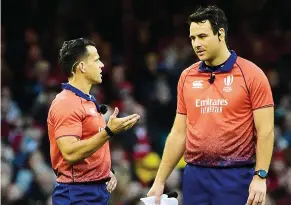  ?? ?? Lack of confidence: Referee Nic Berry, left, was hesitant in Wales-Fiji game