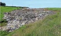  ??  ?? Stuart Fisher’s private dump site in Hawera was filled with a mix of contaminan­ts.