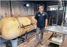  ?? J.C. Reid / Contributo­r ?? Dozier’s now has a Moberg offset barrel smoker.