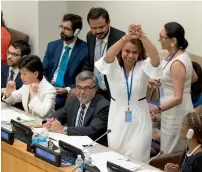  ?? AP ?? Costa Rican Ambassador Elayne Whyte Gomez reacts after the vote at UN headquarte­rs on Friday. —