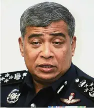  ??  ?? Hard at work: Khalid says the safety and security of the Malaysian people will always the police’s top priority.