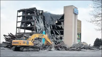 ?? JOE PUCHEK/POST-TRIBUNE ?? The last of the Twin Towers office buildings at Interstate 65 and U.S. Route 30 in Merrillvil­le was razed in December.