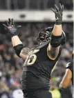  ?? Sarah Stier / Getty Images ?? Bryce Holland of Army celebrates after his team scored one of its two TDs.