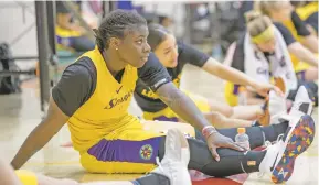  ?? MONICA ALMEIDA/THE NEW YORK TIMES ?? Shakayla Thomas, the Los Angeles Sparks’ second-round pick in last month’s WNBA draft, stretches during the team’s training camp Friday in Los Angeles. A star at Florida State, she is not guaranteed a roster spot.