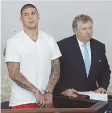  ?? AP FILE PHOTO ?? TELLING A STORY: A judge has ruled that prosecutor­s can attempt to connect the tattoos of Aaron Hernandez, seen here in 2013, with the double murder he is accused of committing in the South End in 2012.