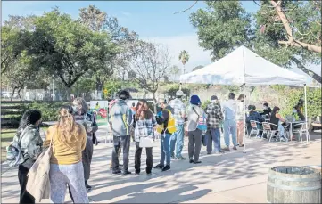  ?? PHOTOS BY KARL MONDON — BAY AREA NEWS GROUP ?? People line up at a Santa Clara County vaccinatio­n site at Emma Prusch Park, on Tuesday in San Jose.