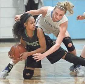  ?? DAVE KALLMANN / MILWAUKEE JOURNAL SENTINEL ?? St. Thomas More's Taylor Kirby (right) ranks second on the team in scoring and leads it in rebounding.