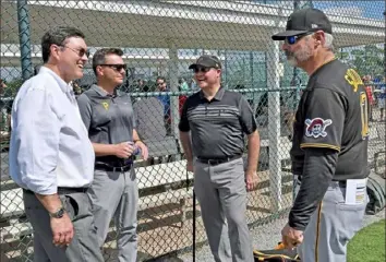  ?? Matt Freed/Post-Gazette ?? Pirates team owner Bob Nutting, left, talks with general manager Ben Cherington, president Travis Williams and manager Derek Shelton at spring training Monday in Bradenton, Fla.