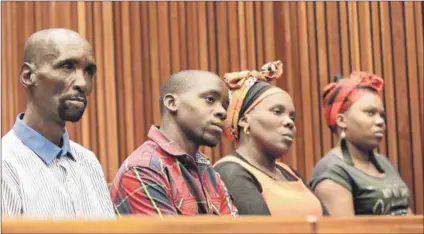  ??  ?? Loss: Michael Komape’s family in court on Monday. They were not present when the judge said punitive damages were not appropriat­e and wouldn’t serve the interests of society. Photo: Antonio Muchave/Gallo