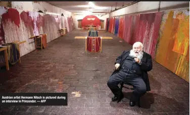  ?? ?? Austrian artist Hermann Nitsch is pictured during an interview in Prinzendor. — AFP