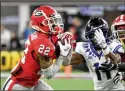  ?? HYOSUB SHIN.HYOSUB.SHIN@AJC.COM ?? Defensive back Javon Bullard (left) grabs one of his two intercepti­ons in the CFP championsh­ip game against TCU on Jan. 9.