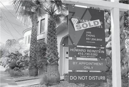  ?? JEFF CHIU AP ?? Existing home sales fell 0.7 percent last month from July. Sales slumped 15.3 percent compared with the same month last year.