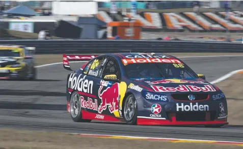  ??  ?? HOT FORM: Jamie Whincup on his way to the fastest qualifying time yesterday at Hidden Valley Raceway.