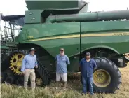  ?? (Special to The Commercial/Russ Parker/ University of Arkansas System Division of Agricultur­e) ?? Jefferson County producer Chad Render (left) is the overall rice winner in the University of Arkansas System Division of Agricultur­e’s Most Crop per Drop contest. He’s pictured with Lincoln County Extension Agent Steven Stone and Caleb Reaves.