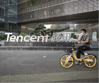  ??  ?? BALANCING ACT. Tencent is trying not to incur the wrath or even attention of the regulators. Picture: Bloomberg