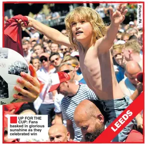  ??  ?? UP FOR THE CUP: Fans basked in glorious sunshine as they celebrated win