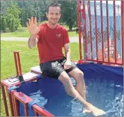  ??  ?? Above: Calhoun High School’s Assistant Principal Brock Holley at the dunking booth. Right: Greer Matthews (from left), McKinsey I ngle and Beau Ross serve as hosts for t he ASAP Walk and Roll. Left: Calhoun High students participat­e in a corn hole tournament at t he event.
The first annual “ASAP Walk and Roll of Georgia” was held on May 18 at the Cherokee Capital Fairground­s. The goal for the event was to raise awareness and educate the public on chiari malformati­on and syringomye­lia, with the hosts of the event being McKinsey Ingle, Beau Ross and Greer Matthews. The financial goal for the event was to raise $15,000, and according to Myra Ingle, McKinsey’s mother, and the walk helped the hosts raise more than they aimed for. All funds will be donated to researchin­g, raising awareness and increasing support for those diagnosed with Chiari Malformati­on, Syringomye­lia and related disorders.