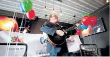  ?? JASON BAIN/EXAMINER ?? Rick Fines performs at One Eighty on Hunter St. W as details of downtown events related to Canada's 150th anniversar­y were announced Thursday. See more photograph­s from the announceme­nt in the online gallery at www.thepeterbo­roughexami­ner.com.