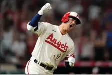  ?? ASHLEY LANDIS, AP — THE ASSOCIATED PRESS ?? Los Angeles Angels designated hitter Shohei Ohtani (17) reacts as he runs the bases after hitting a home run during the sixth inning of a baseball game against the New York Yankees in Anaheim, Calif., Wednesday, Aug. 31, 2022. David Fletcher and Mike Trout also scored.