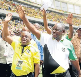  ?? Picture:THULI DLAMINI ?? OFFICIALS WELCOMED: ANC top officials, including its president, Cyril Ramaphosa, right, and provincial chairperso­n Sihle Zikalala, greet the crowd at Moses Mabhida Stadium in Durban as they arrive for the ANC manifesto launch