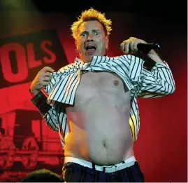  ?? ?? Above John Lydon of the Sex Pistols performs at the Isle of Wight Festival in 2008, in Newport, UK.