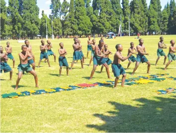  ??  ?? LIKE THE ALL BLACKS . . . The Banket Primary School rugby boys team perform their brand of haka, which has been popularise­d by the All Blacks of New Zealand, on the opening day of the Dairibord Schools Rugby Festival at Prince Edward School
