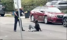  ?? Courtesy of Todd J. Hollis Law ?? A screen grab from video shows Jim Rogers, right, who died Oct. 14, 2021, interactin­g with Pittsburgh police Officer Keith Edmonds, left. Rogers died after the altercatio­n with Officer Edmonds.