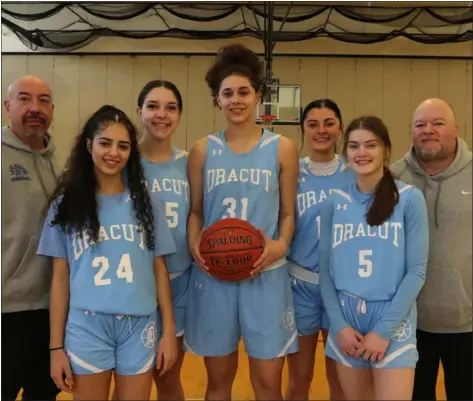  ?? JULIA MALAKIE — LOWELL SUN ?? From left, head coach Peter Witts, starters Lamees Alasaad, Emma Felker, Amaya Alkassar, Brodie Gannon and Ashlee Talbot, and assistant coach Steve Talbot. Dracut High will play Foxboro for the Division 2state girls basketball title Saturday.