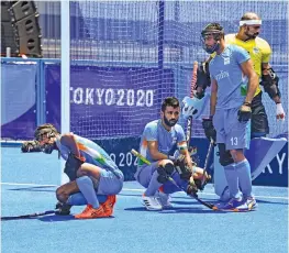  ?? PTI ?? India players are distraught during their men’s hockey semifinal against Belgium at the Oi Hockey Stadium in Tokyo on Tuesday. —