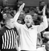  ?? BENNETT/AP JULIE ?? Florida coach Mike White reacts to a call against his team during the first half on Saturday night at Auburn.