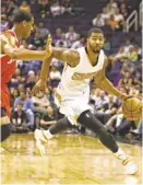  ?? ROB SCHUMACHER/AZCENTRAL SPORTS ?? Suns power forward Markieff Morris dribbles against the Los Angeles Clippers during a preseason game last week.