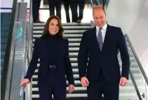  ?? AFP PHOTO ?? WELCOMING THE WALESES
The United Kingdom’s Prince William (right) and his wife Catherine arrive at Boston Logan Internatio­nal Airport on Wednesday, Nov. 30, 2022.