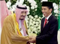  ?? AP ?? The Custodian of the Two Holy Mosques, King Salman bin Abdulaziz of Saudi Arabia, and Indonesian President Joko Widodo during their meeting in Bogor, Indonesia on Wednesday. —