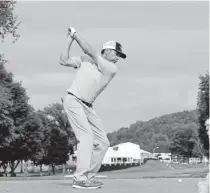  ?? Michael Cohen, Getty Images ?? Doug Barron hits his drive on th ninth hole Saturday during the second round of the Dick’s Sporting Goods Open at Enjoie Golf Course in Endicott, N.Y.