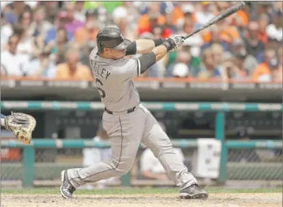  ?? | CARLOS OSORIO~AP ?? Sox catcher Josh Phegley belts a grand slam in the sixth inning off Tigers starter Anibal Sanchez.