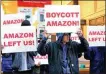  ?? REUTERS ?? People protest Amazon’s change to not open an office in New York on Friday.
